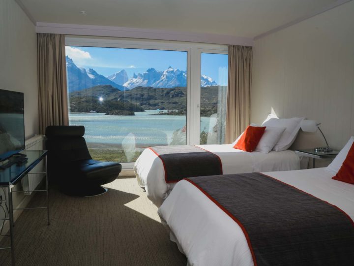 Views from the bedroom across Lago Grey and the Cuernos del Paine from Hotel Lago Grey, one of the top Torres del Paine hotels in Chilean Patagonia
