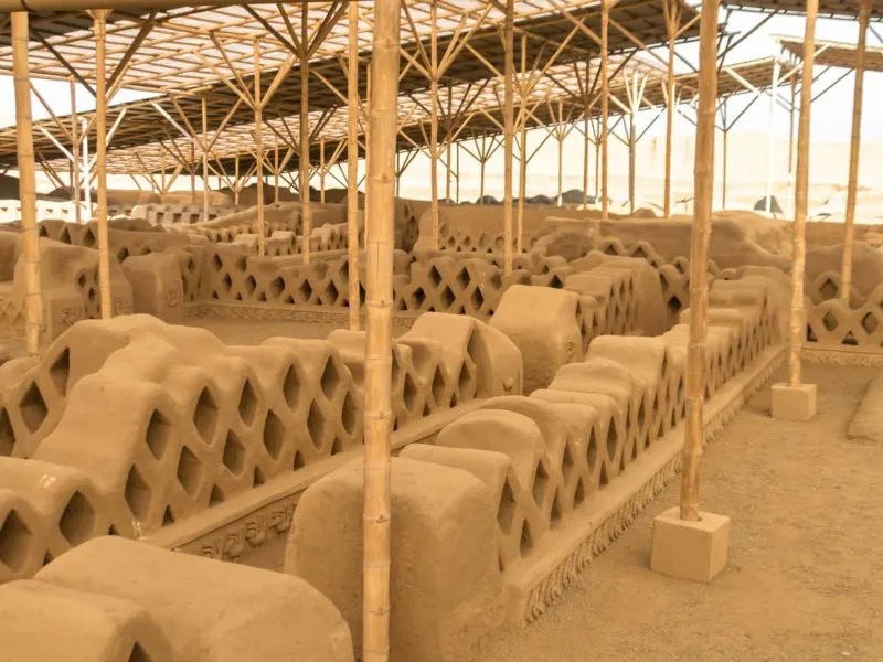 Rows of restored adobe walls in the Chan Chan complex, near Trujillo, Peru