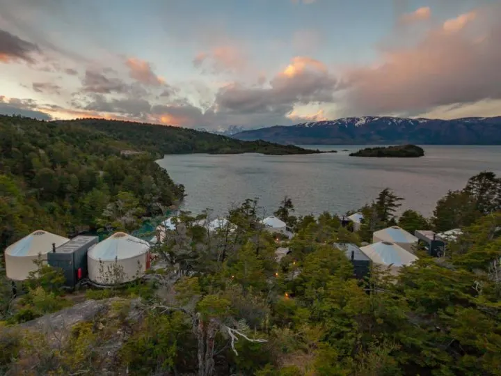 Views across Lago Toro and the Cuernos del Paine from above the glamping domes of Patagonia Camp, one of the top Torres del Paine hotels in Chilean Patagonia