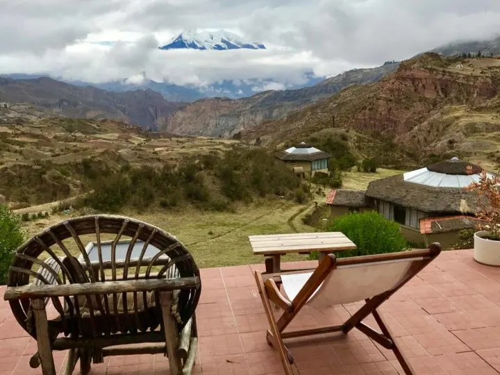 Views of Illimani peeping through the clouds from the terrace of Allkamari EcoResort