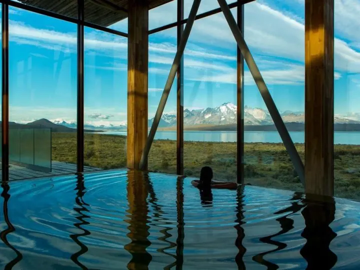 Views from the infinity pool at Tierra Patagonia, one of the top Torres del Paine hotels in Chilean Patagonia