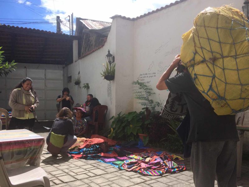 Visitors selling their wares outside an English language school yard in Guatemala