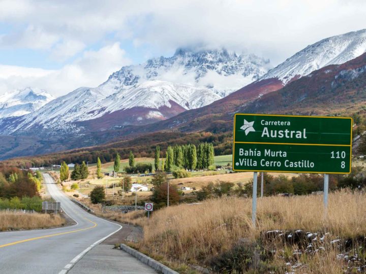 Sign for Chile's Carretera Austral with mountains in the background