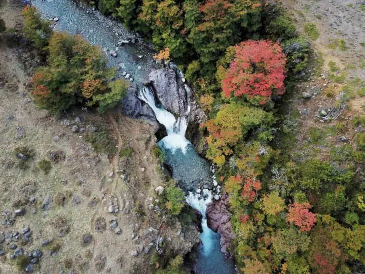 Aerial shot of a waterfall in Cerro Castillo National Park, along Chile's Carretera Austral