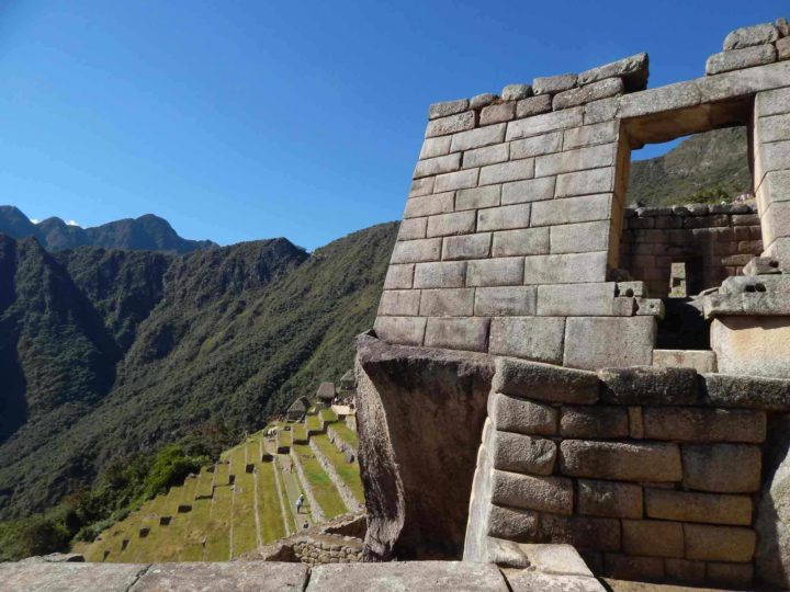 The Sun Gate with terraces in the background at Machu Picchu