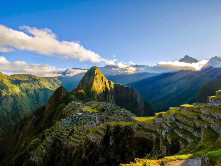 A view of Machu Picchu at dawn from above the ruins