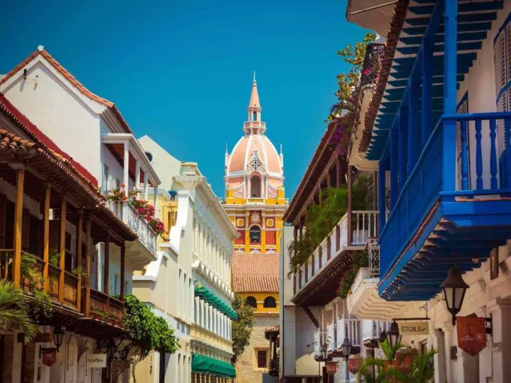 Catedral de Santa Catalina - A row of buildings with balconies and a tower