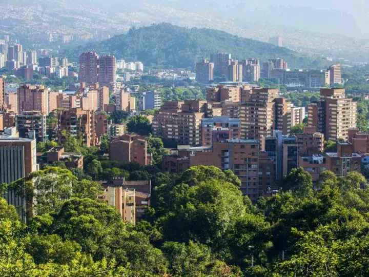 The buildings of Medellin Colombia among the trees.