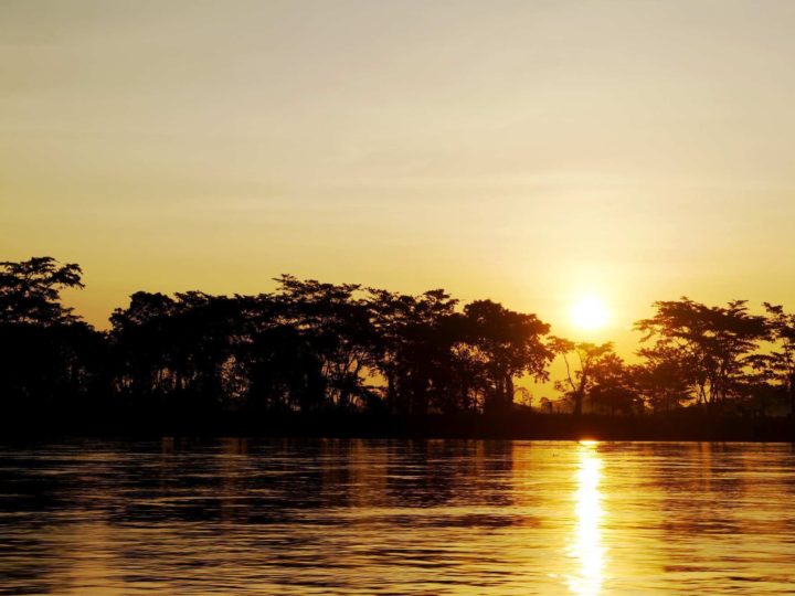 Sunset along the river in Palomino Colombia.