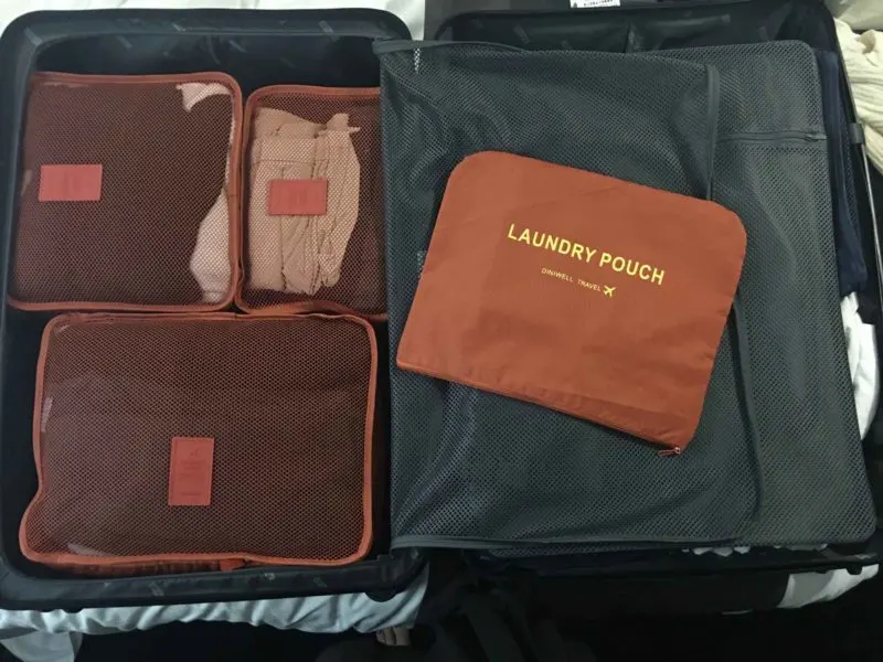 Packing cubes inside a suitcase, an ideal gift for the frequent traveler