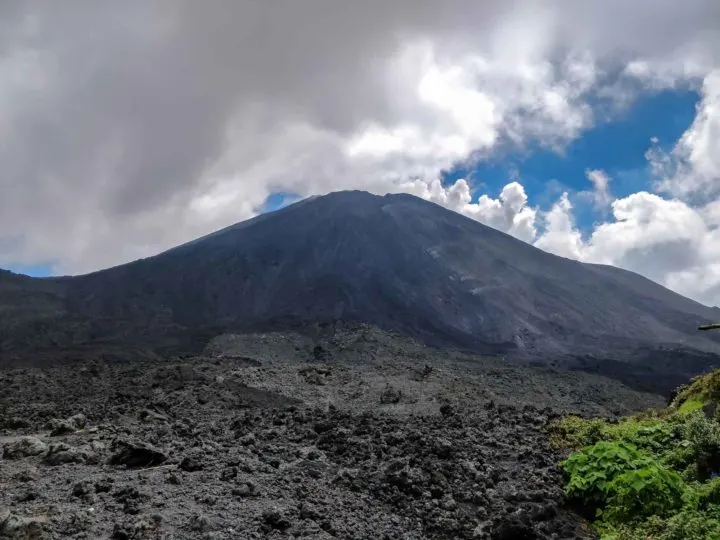 The crater of Volcan Pacaya rises out of the landscape of cooled lava