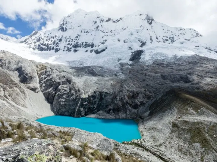 The electric blue waters of Laguna 69, Huaraz's most famous hike in the Cordillera Blanca