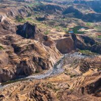 A drone photo of Peru's Colca Canyon showing the Rio Colca