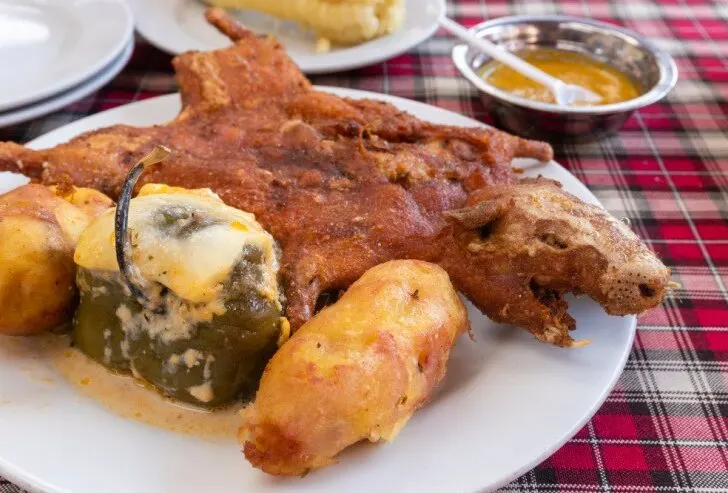 Cuy chactado is a famous food in Peru, a traditional roasted guinea pig delicacy