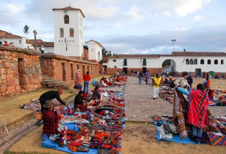 Chincheros local market is an old-world trading post alive with vibrant colors and unique handicrafts for sale.