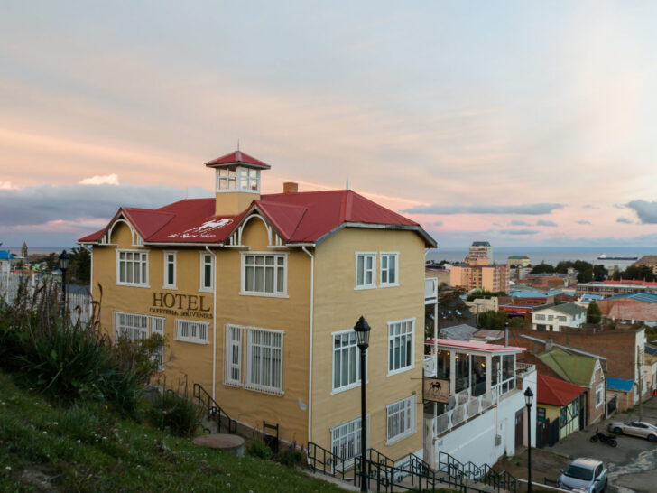 Photo of La Yegua Hotel. A beautiful yellow building with an amazing view