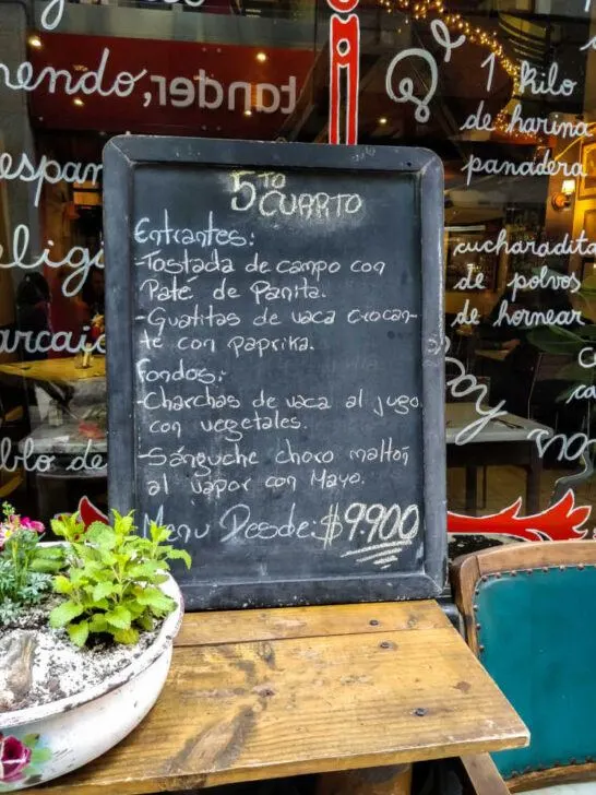 Handwritten blackboard with specials located on the front of the restaurant