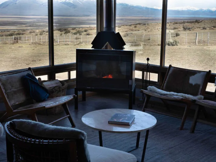 The lounge area of Cerro Guido in Torres del Paine National Park, one of the best hotels in Chile, with views across the Cerro Massif 