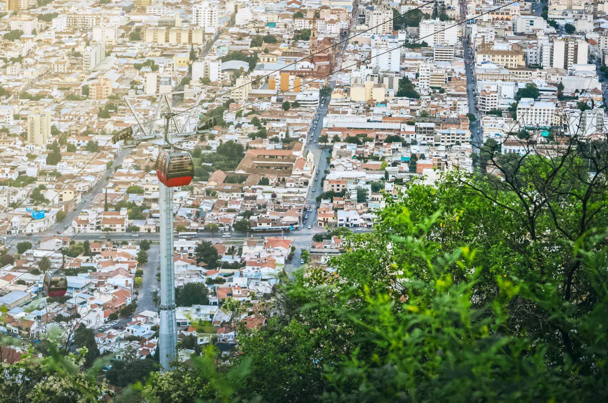 An aerial view of the cable car and city of Salta. When looking for things to do in Salta, a trip on the cable car is a must.