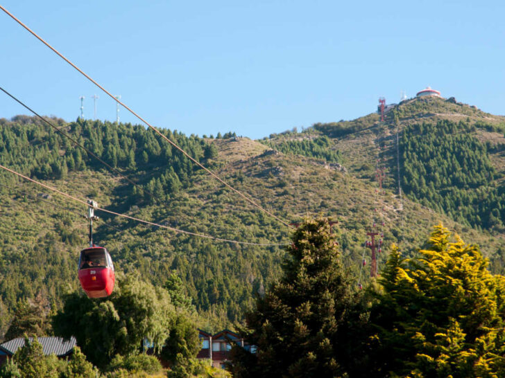 A cable car scaling the heights of Cerro Otto, a popular viewpoint offering spectacular mountain and lake views and one of the best things to do in Bariloche.